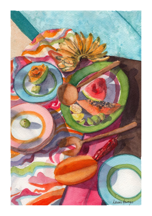 Watercolour art print of a tropical poolside table setting with fruit, fun patterned fabric and bold colours, hand-painted by Laura Hamzic.