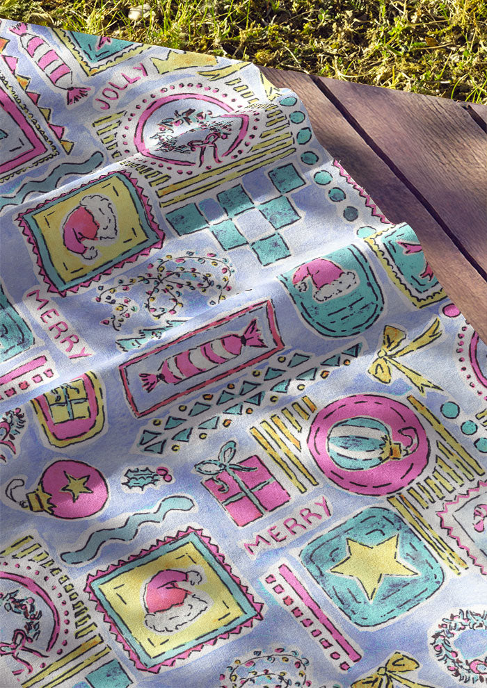 Christmas fabric design with Santa Hats, trees, bows and stars in frames using pastel colours. Australian Surface Pattern Design by Sydney Artist Laura Hamzic
