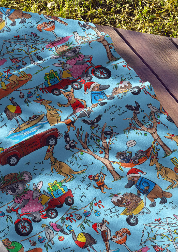 Playful Aussie Christmas fabric design featuring native animals, BBQs, and backyard cricket. Australian Surface Pattern Design by Brisbane Artist Laura Hamzic