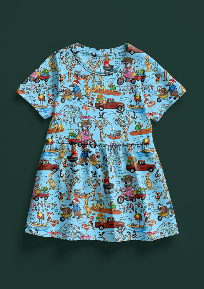 Playful Aussie Christmas girls dress design featuring native animals, BBQs, and backyard cricket. Australian Surface Pattern Design by Brisbane Artist Laura Hamzic