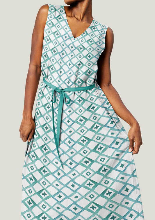 Dress featuring Diamond Lattice pattern, bold watercolour diamond grid with spots and crosses in the centre, creating a relaxed Mediterranean coastal aesthetic.