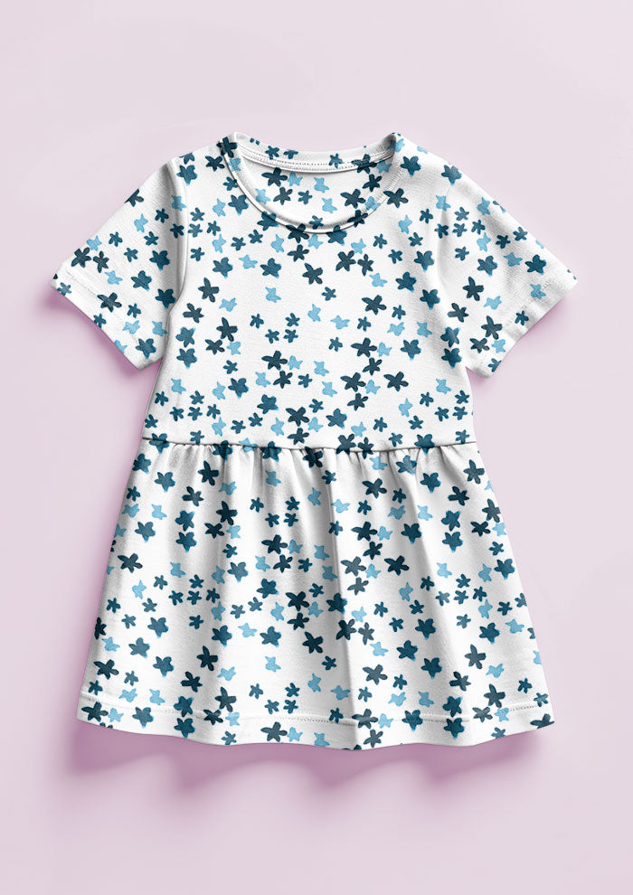 Ditsy Daisy - Little Girls Dress featuring Floral pattern design by Laura Hamzic Australian Surface Pattern Designer - Denim on White