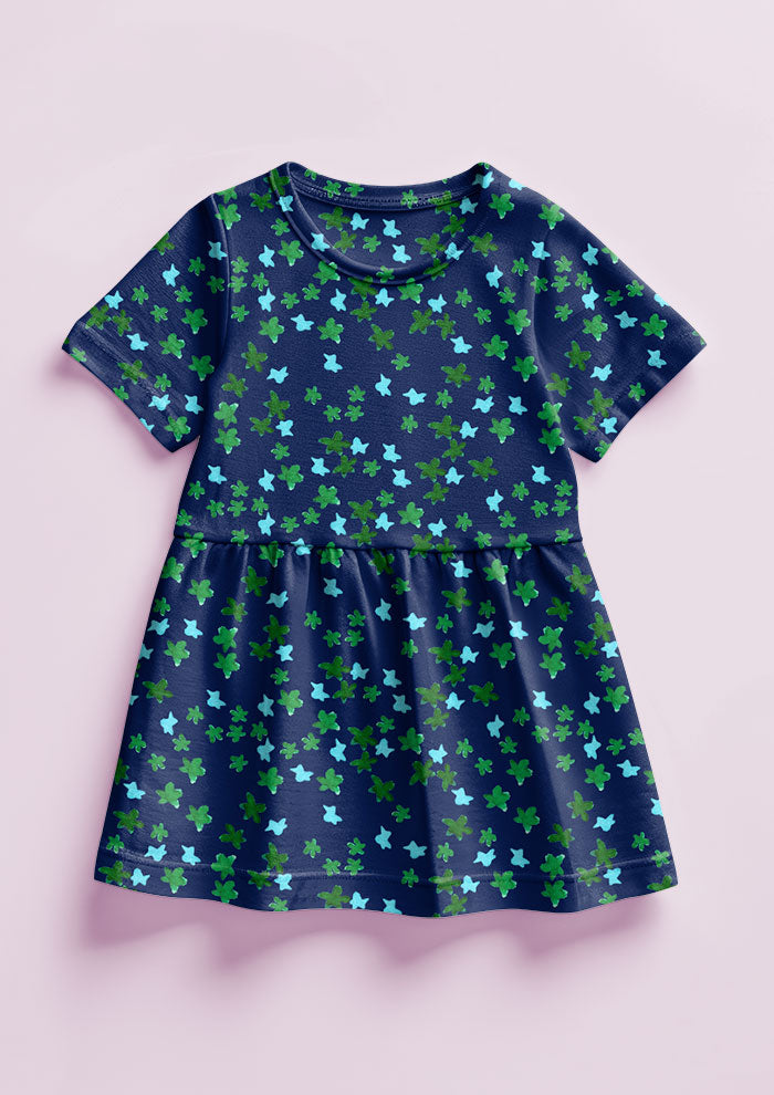 Ditsy Daisy - Little Girls Dress featuring Floral pattern design by Laura Hamzic Australian Surface Pattern Designer - Green and Blue on White