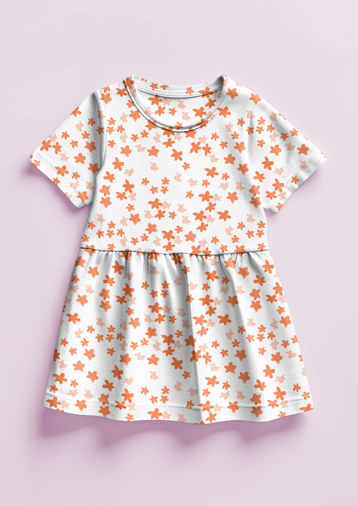 Ditsy Daisy - Little Girls Dress featuring Floral pattern design by Laura Hamzic Australian Surface Pattern Designer - Orange on White