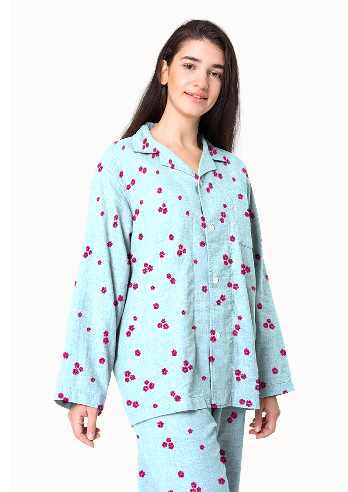 Women's pajamas mockup with the Dotty Bloom (Blue) pattern by Laura Hamzic, Australian surface pattern designer