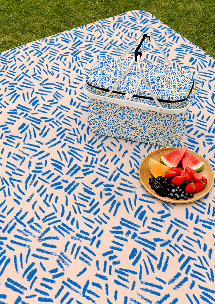 Picnic mat with earthy textured surface pattern – bold pencil strokes inspired by cracked dry ground and natural bush etchings. Rugged, adventurous outdoor textile design.