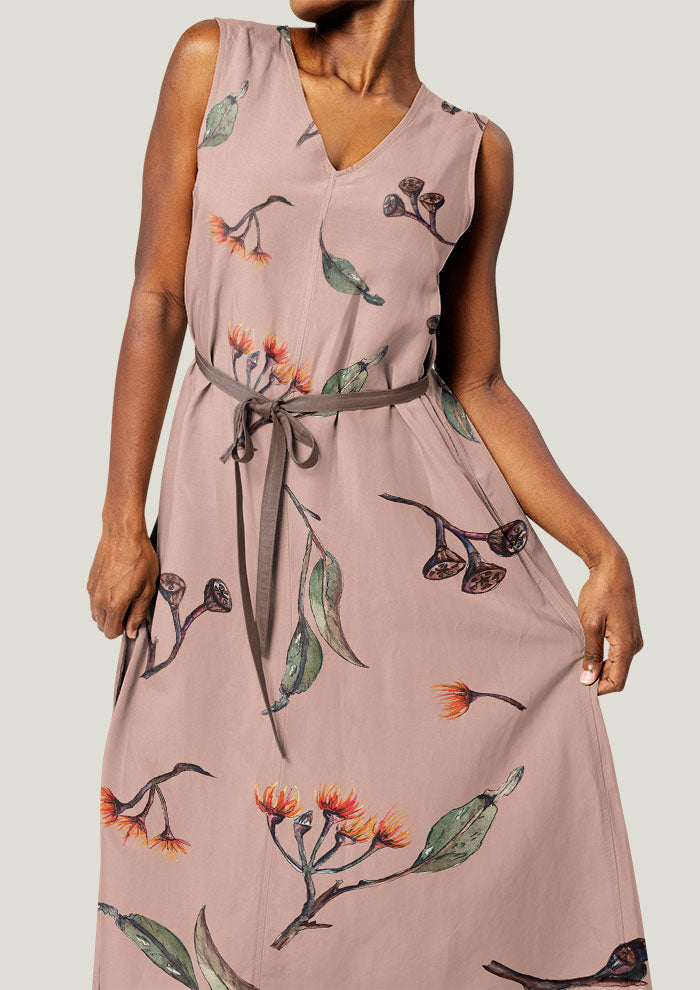 Dress featuring Eucalypt Echo pattern in a dusty pink palette, flowing eucalyptus elements spaced widely for dramatic impact on wallpaper or large fabric prints.