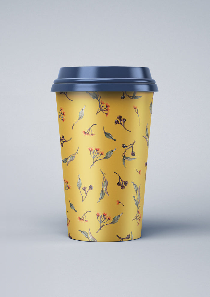 Coffee Cup featuring Eucalypt Echo pattern in a mustard palette, flowing eucalyptus elements spaced widely for dramatic impact on wallpaper or large fabric prints.
