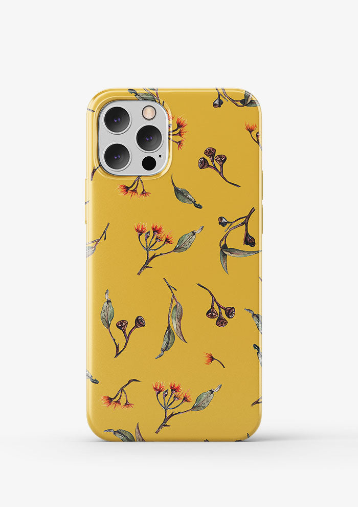 Phone case featuring Eucalypt Echo pattern in a mustard palette, flowing eucalyptus elements spaced widely for dramatic impact on wallpaper or large fabric prints.