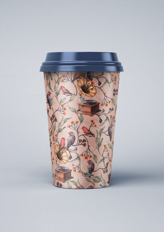 Disposable coffee cup wrapped in Laura Hamzic's Finch Falsetto pattern, eucalyptus blossoms and finches growing from gramophones.