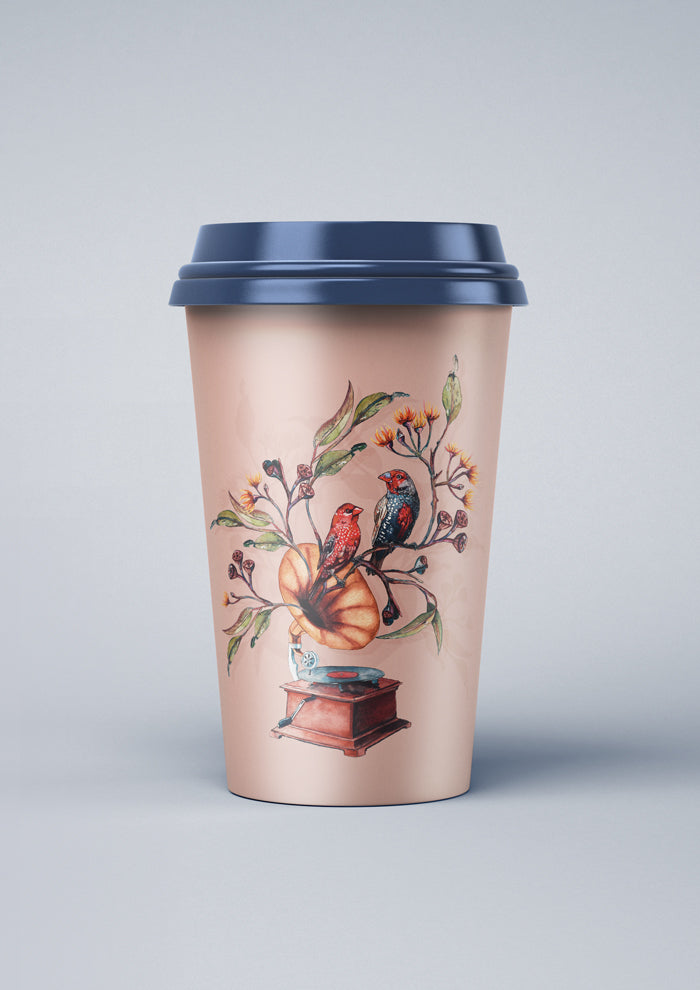 Coffee cup featuring the Finch Falsetto placement illustration, red firetail finches perched on a gramophone, with native foliage growing from it in vibrant, true-to-life colours