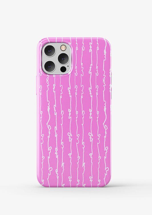 White on Pink Garden Squiggle pattern by Australian surface pattern designer Laura Hamzic mocked up on a dress