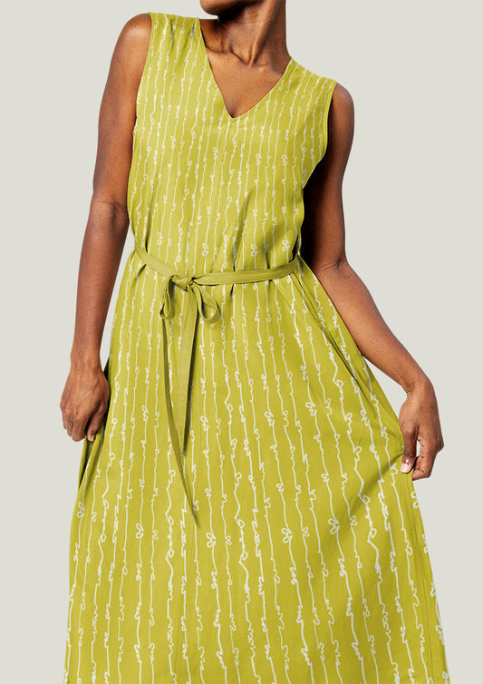 White on Yellow Garden Squiggle pattern by Australian surface pattern designer Laura Hamzic mocked up on a dress