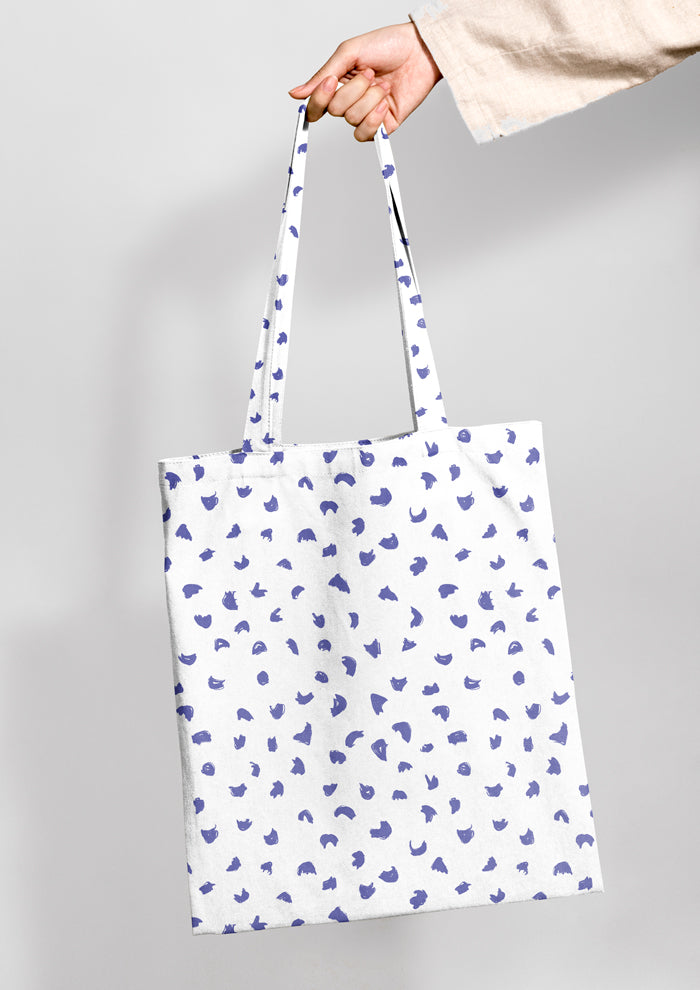 Shopping bag featuring Gumnut speckle pattern design by Laura Hamzic - Blue on White Colourway