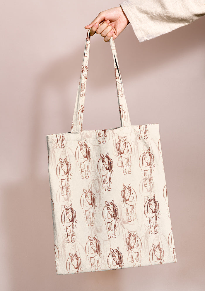 Tote bag mockup displaying the Horsing Around pattern by Laura Hamzic, Australian surface pattern designer