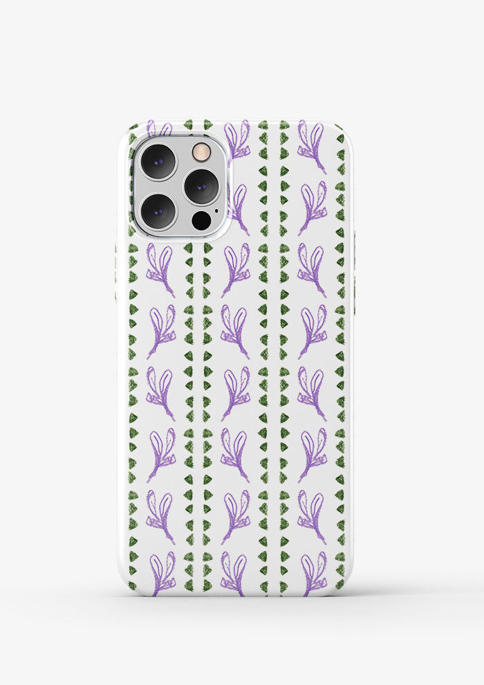 Phone case mockup displaying the Jacaranda Path pattern by Laura Hamzic, Australian surface pattern designer