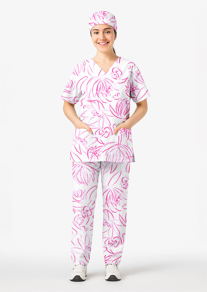 Person wearing a pink and white floral scrub set on a white background