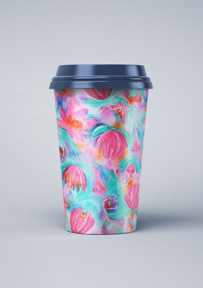 Coffee Cup featuring Lily Lover pattern, bold, painterly water lilies in pink, teal, lilac, and yellow with soft white detailing, creating a striking design