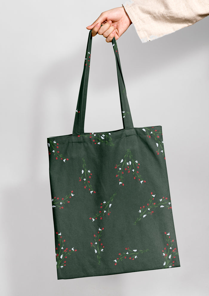 Tote bag mockup showcasing the Mock Orange Berries (Green) pattern by Laura Hamzic, Australian surface pattern designer