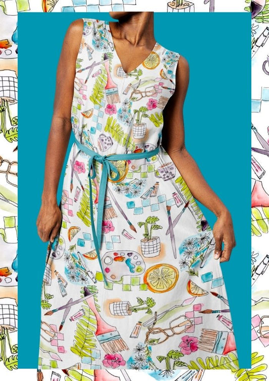 Women’s dress featuring the Painter’s Playground pattern with playful hand-painted artist studio illustrations