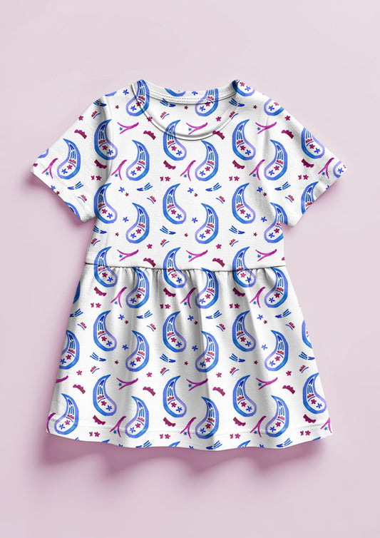 Pink and purple Paisley Parade pattern on little girl's dress mockup. Pattern design by Laura Hamzic, Australian Artist.