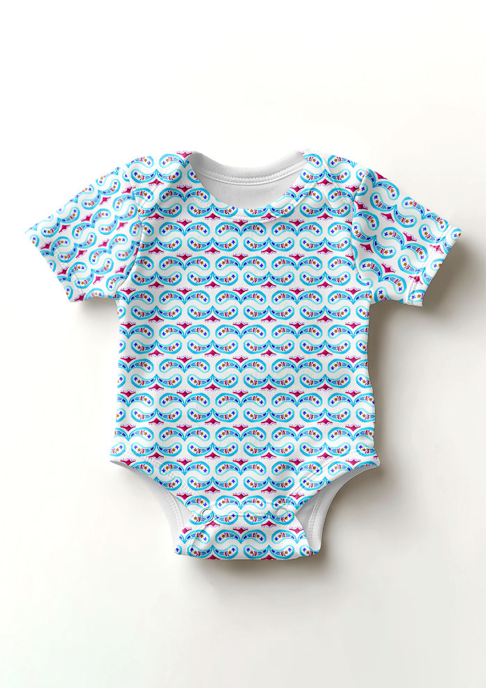 Pink and blue Paisley Whirl pattern on baby onesie mockup. Pattern design by Laura Hamzic, Australian Artist.