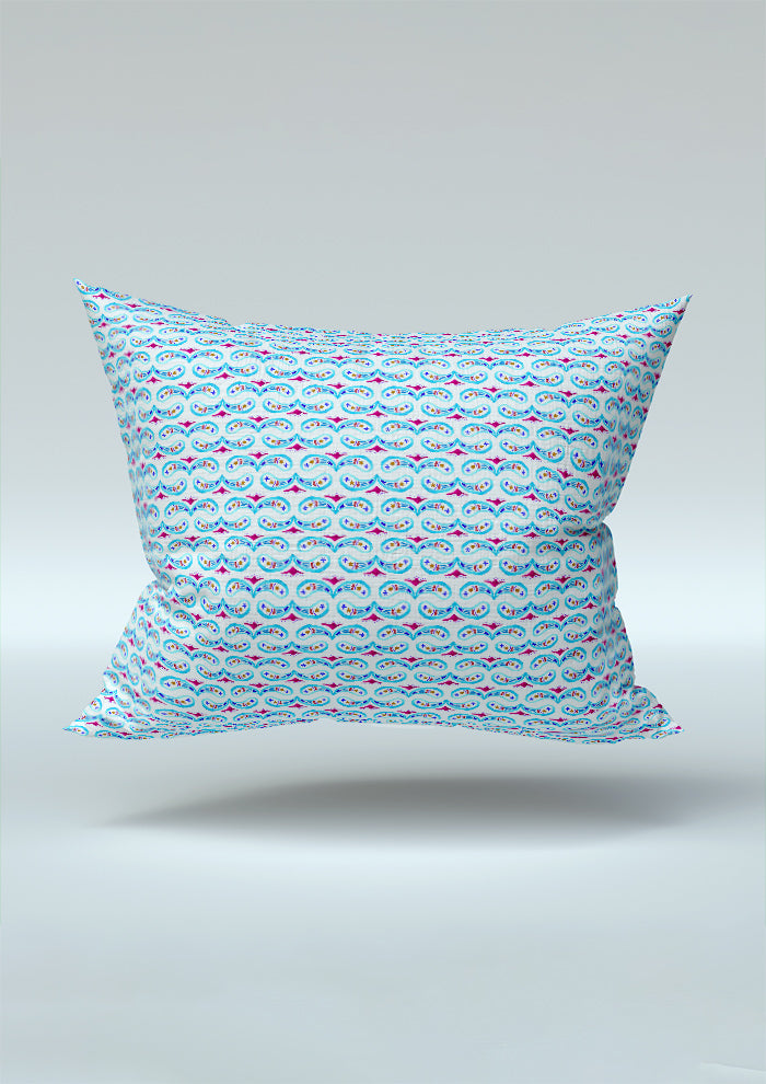 Pink and blue Paisley Whirl pattern on cushion mockup. Pattern design by Laura Hamzic, Australian Artist.