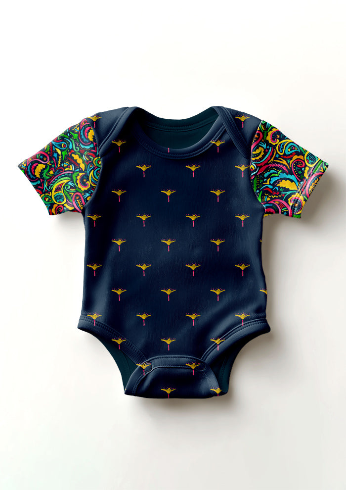 Rainbow Paisley Days pattern on navy, baby onesie sleeves with Sea Petal body. Pattern design by Laura Hamzic, Australian Artist.