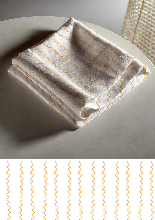 Tea towel mockup featuring the Stitch in Time pattern by Laura Hamzic, Australian surface pattern designer
