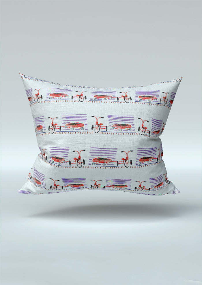 Cushion mockup featuring the Trike Tracks pattern by Laura Hamzic, Australian surface pattern designer