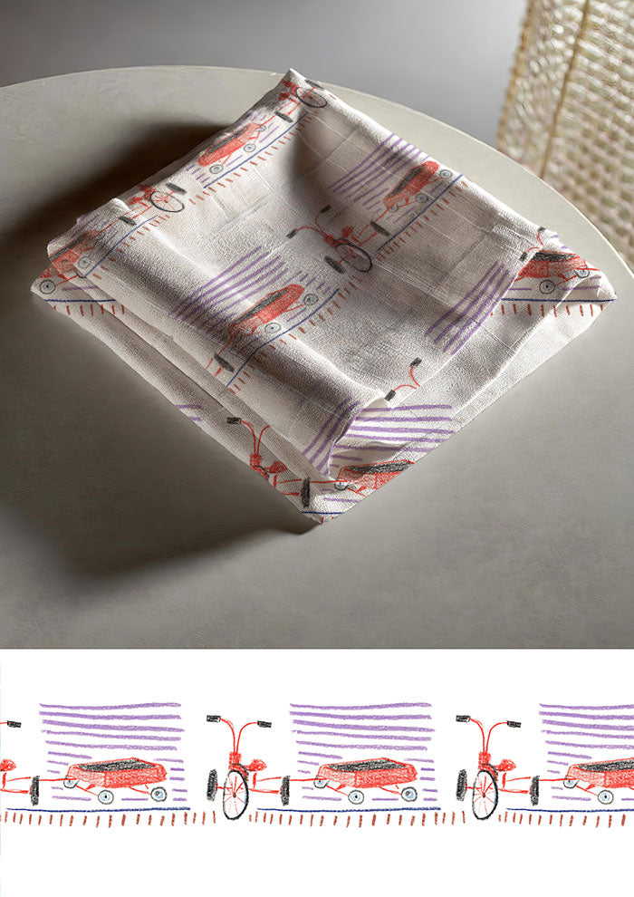 Tea towel mockup showcasing the Trike Tracks pattern by Laura Hamzic, Australian surface pattern designer