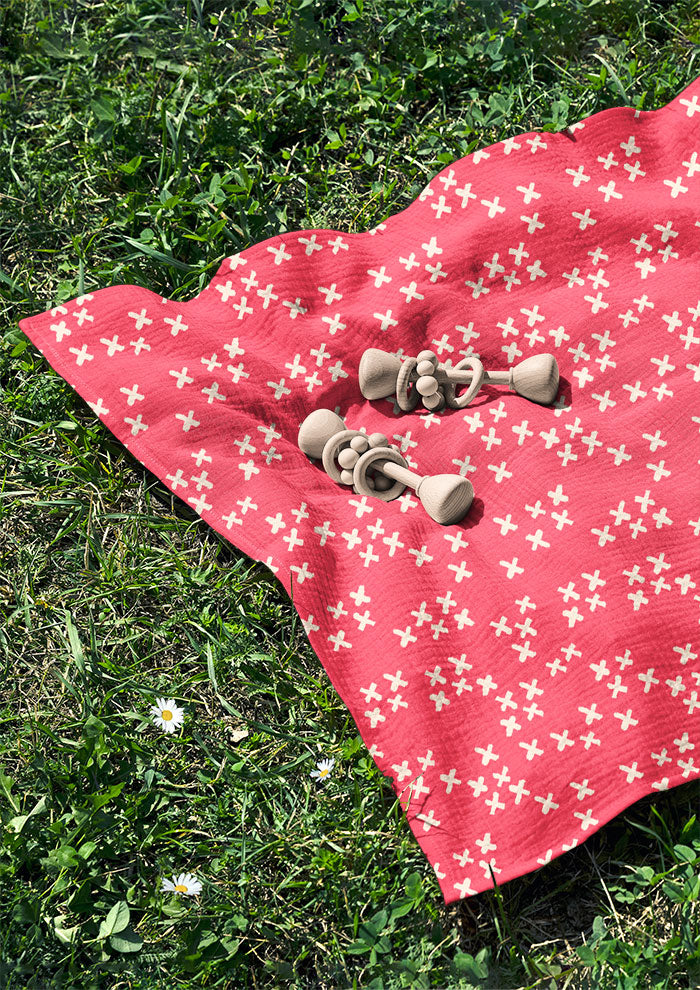Swaddle with X Marks the Spot playful sketchy X pattern – bold hand-drawn pencil marks inspired by treasure hunts and bush adventures, Australian children’s outdoor design.