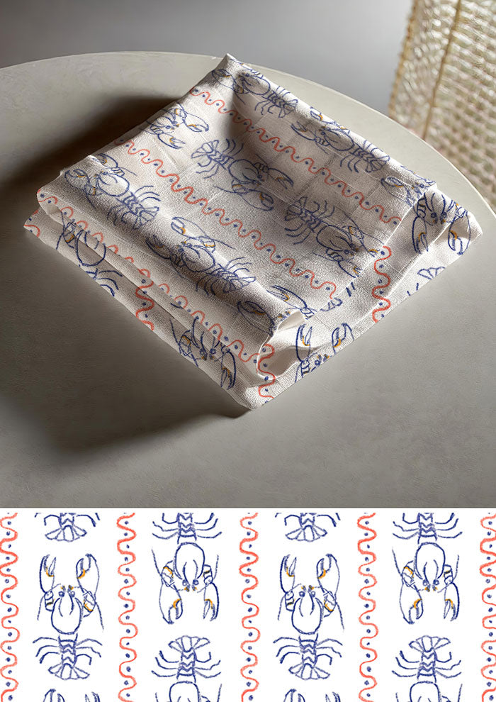 Tea towel mockup with the Yabby Races pattern by Laura Hamzic, Australian surface pattern designer