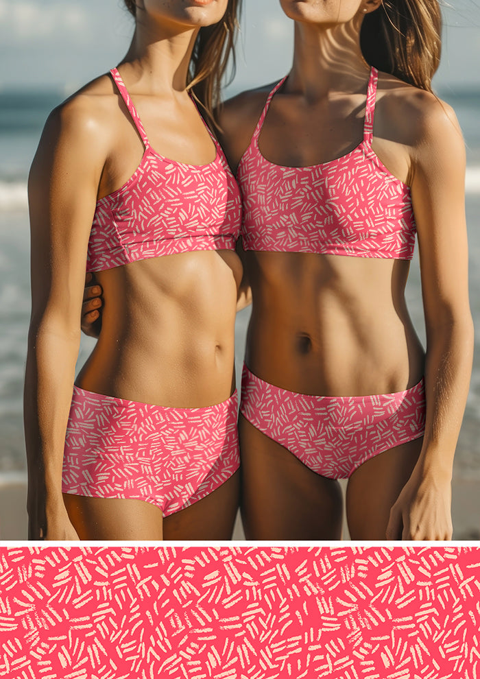 Swimwear featuring earthy textured surface pattern – strong pencil marks and cracked ground effect with natural bush energy. Bold, adventurous fabric design for striking fashion pieces.