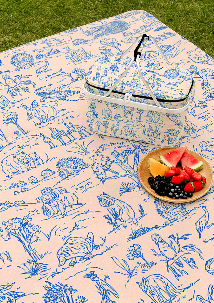 Picnic mat with Australian animal surface pattern – fine liner ink drawings of wombats, kangaroos, emus, and bush creatures. Playful Australiana outdoor textile design.