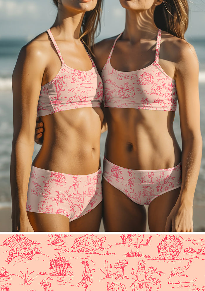 Swimwear featuring Australian animal surface pattern – charming fine liner drawings of wombats, kangaroos, emus, and bush creatures. Storybook-style Australiana fabric design