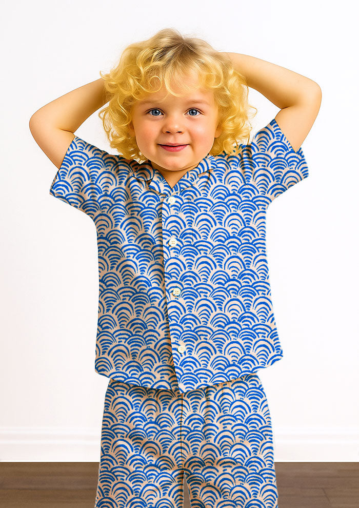 Kids pyjamas with Sand Dune Scallop rhythmic scallop pattern – hand-drawn coloured pencil design inspired by rippling sand dunes, playful Australian surface pattern for children’s sleepwear.