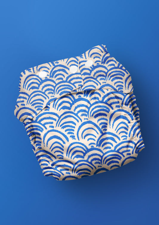 Baby nappy with Sand Dune Scallop rhythmic scallop pattern – coloured pencil texture inspired by sand dunes, playful Australian kidswear fabric, summer-ready children’s design.