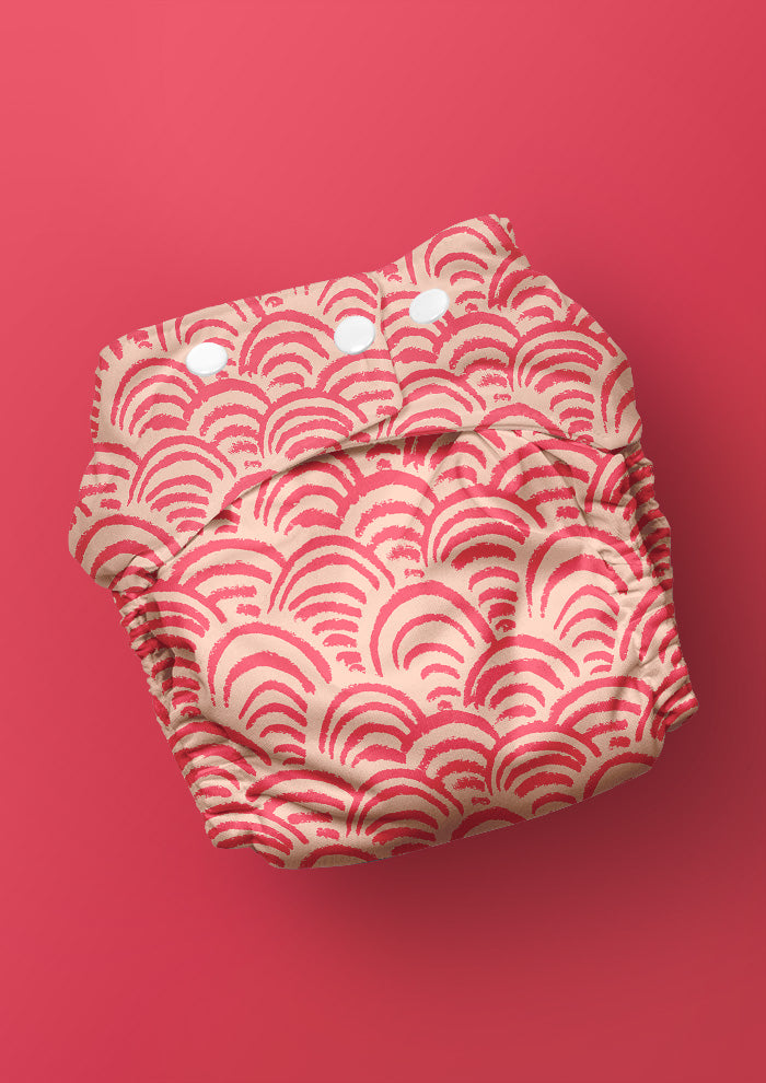 Baby nappy with Sand Dune Scallop rhythmic scallop pattern – coloured pencil texture inspired by sand dunes, playful Australian kidswear fabric, summer-ready children’s design.