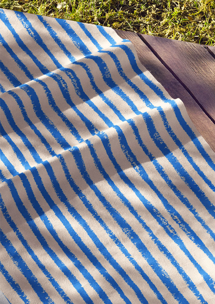 Cotton fabric featuring Sandy Stripe wobbly stripe pattern – lively organic hand-drawn lines inspired by kids playing in the sand, versatile Australian fabric for apparel and kidswear.