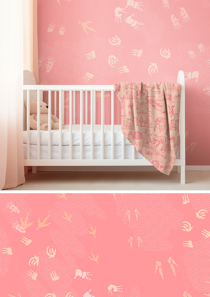 Nursery room with white crib and pink wallpaper featuring whimsical Australian wildlife footprints – kangaroo, echidna, wombat, and more – inspired by bushland trails and nature’s stories. Australian surface pattern design.