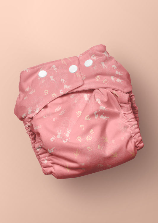 Pink swim nappy diaper featuring whimsical Australian wildlife footprints – kangaroo, echidna, wombat, and more – inspired by bushland trails and nature’s stories. Surface pattern design Australia.
