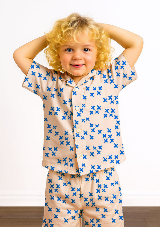 Kids pyjamas with X Marks the Spot bold sketchy X pattern – playful hand-drawn surface design inspired by make-believe treasure hunts, adventurous Australian children’s sleepwear fabric.