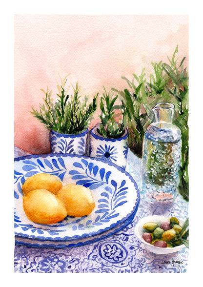 Watercolour art print of a beautiful greek table setting -  blue and white china pattern, rosemary in a delicate vase and lemons, hand-painted by Laura Hamzic.