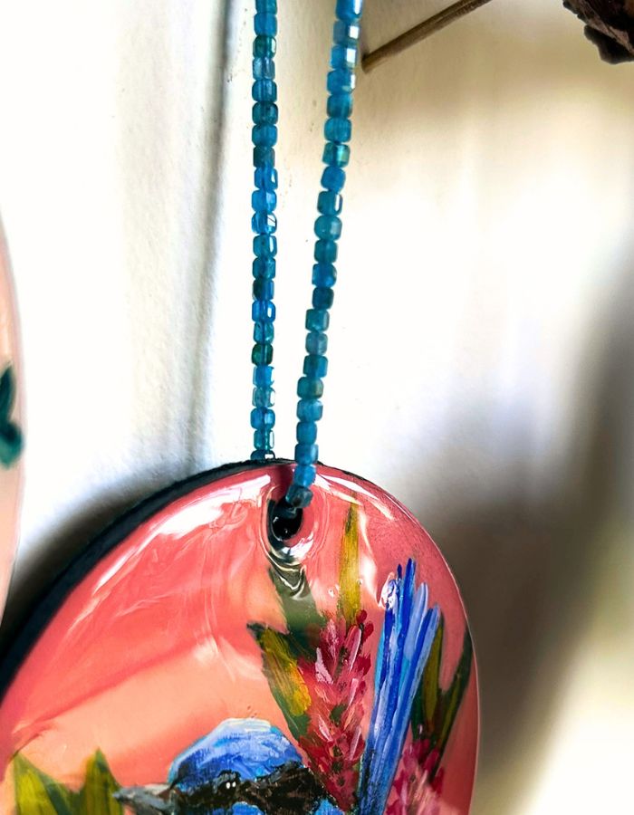Detail of Tiny Dancer fairy-wren ornament showing glossy resin finish and handmade beaded hanger