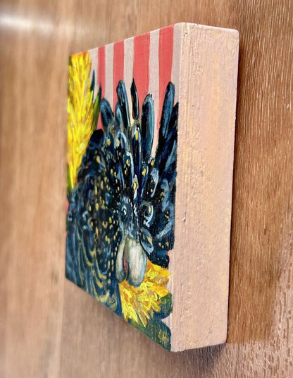 Painted pink striped edges of black cockatoo timber panel