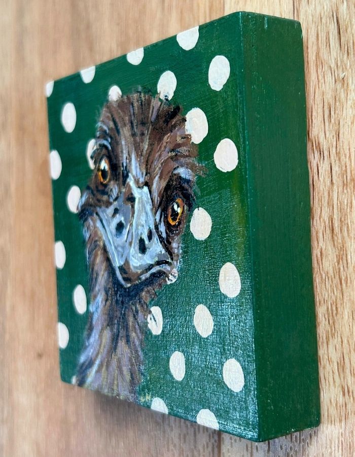 Painted sides of small square emu timber panel