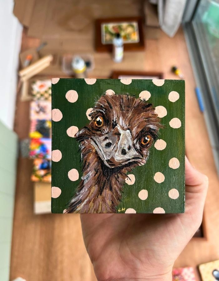 Bush Chook original 10 × 10 cm painting held in hand