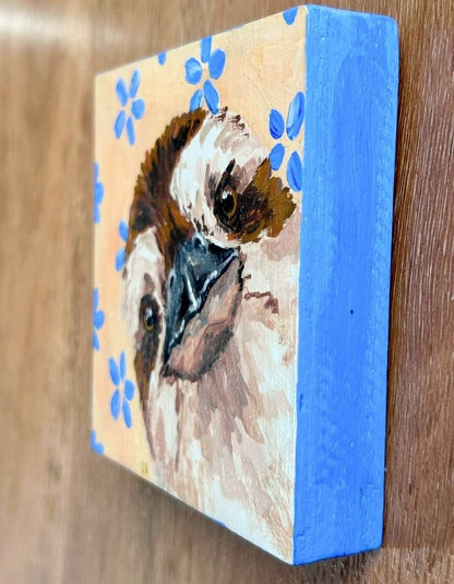 Hand-painted edges of 10 × 10 cm kookaburra timber panel
