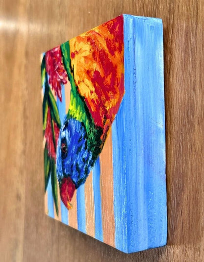 Textured acrylic brushstrokes on colourful lorikeet artwork
